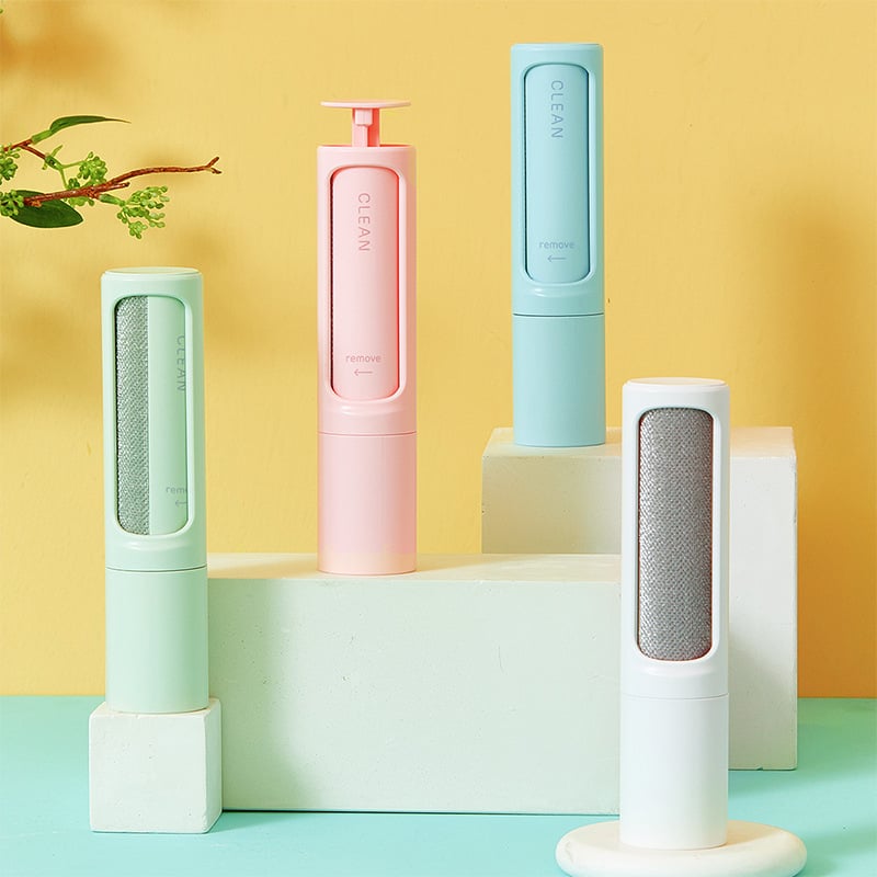 FURDUO 2-in-1 reusable pet hair remover brush and lint roller for removing pet hair from clothing and furniture.